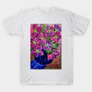 A beautiful and vibrant colorful flowers in a tall glass vase T-Shirt